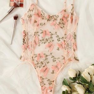 Pink lace lingerie bodysuit